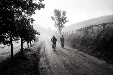 two people riding a bike